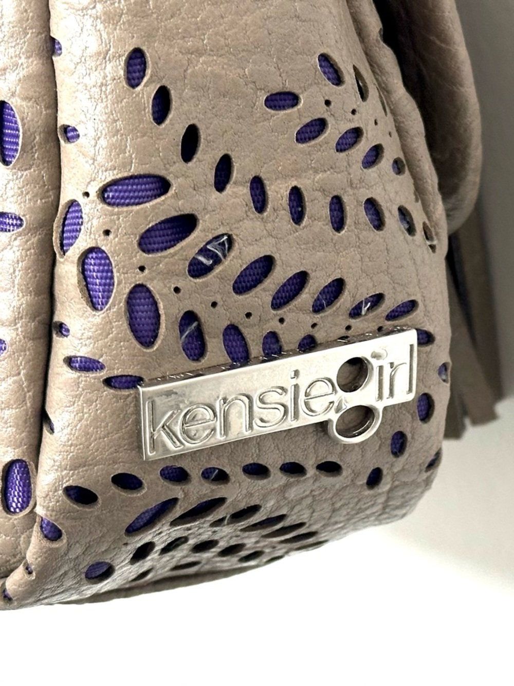 Kensie Girl Taupe Laser-Cut Mini Crossbody Bag with Purple Accent - Picture 10 of 13